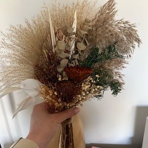 Dried floral arrangement in vase